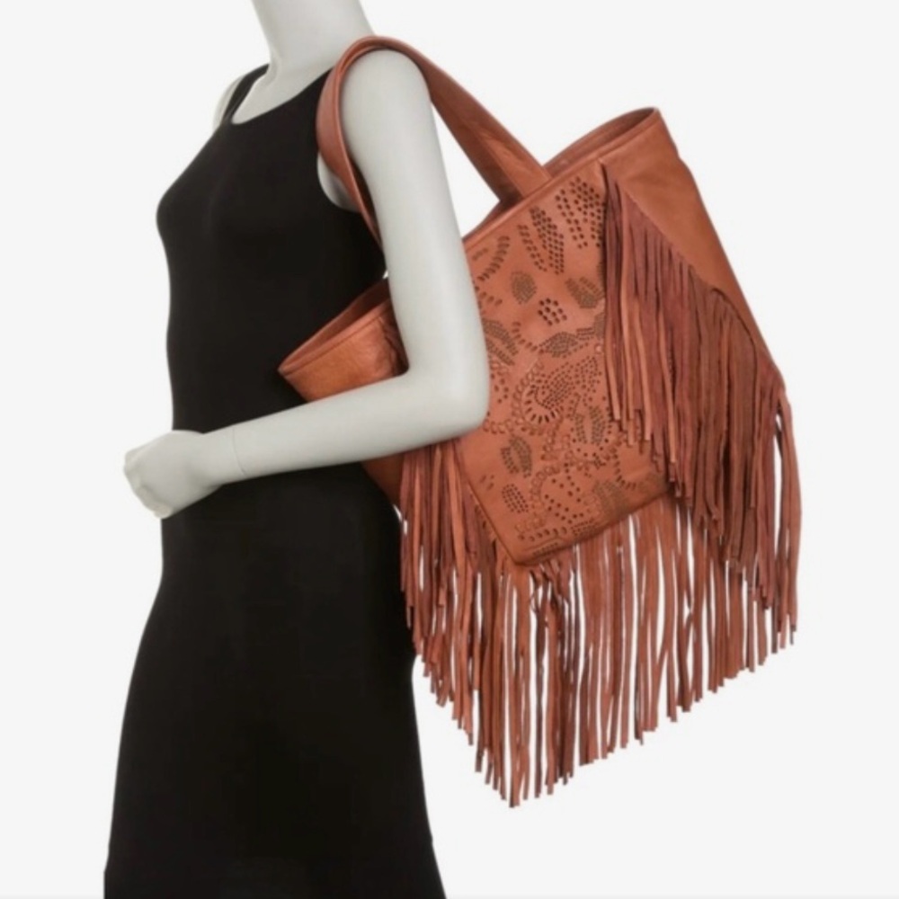Brand new with tag Frye leather fringe bag.